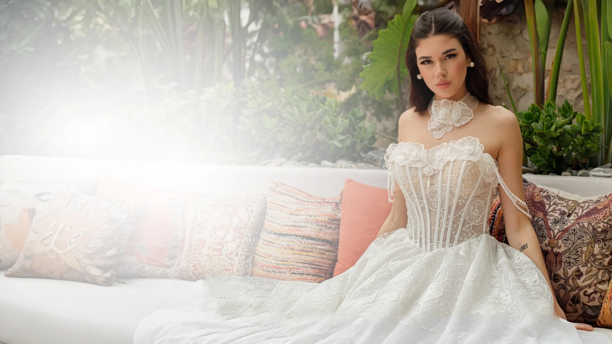 Photo of the model wearing a bridal gown.