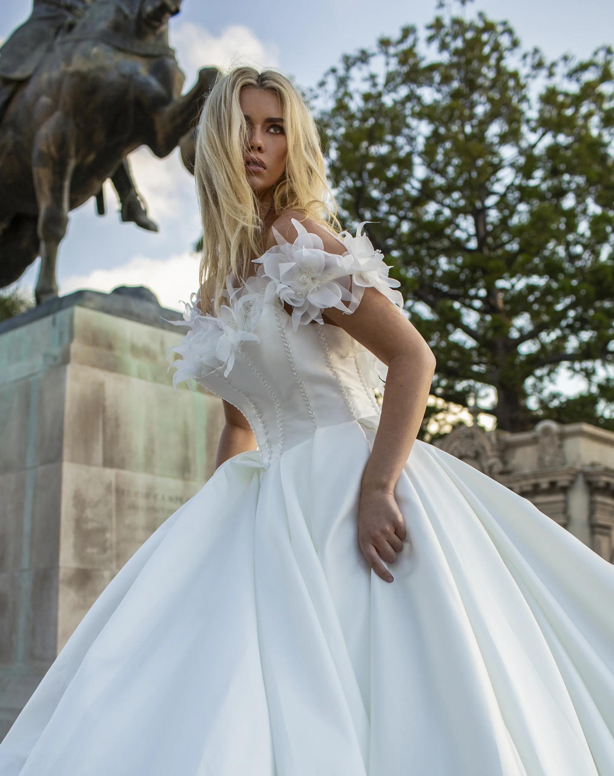 Photo of the model wearing a bridal gown