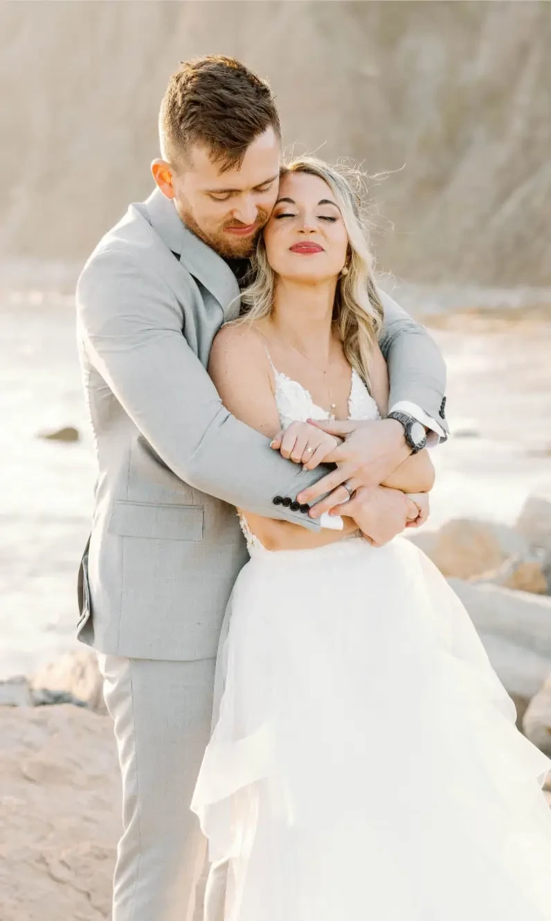 Photo of the smiling real bride and groom